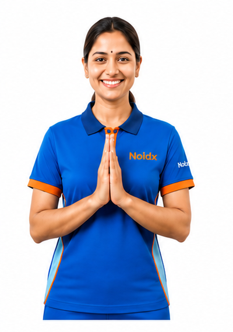 Verified Broomy house-help professional in uniform greeting with a namaste
